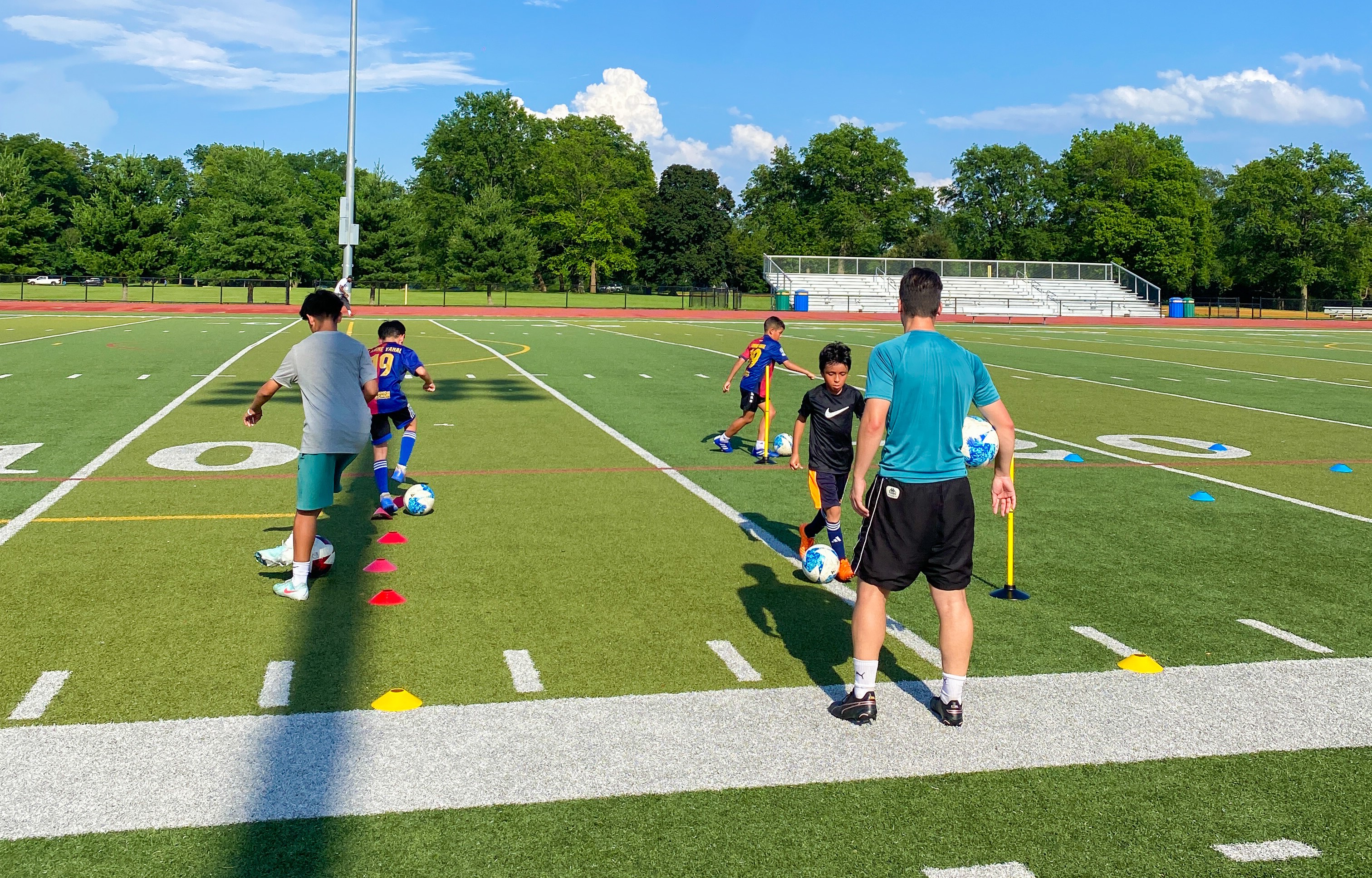 Coach Cufi running an outdoor training session in New Jersey